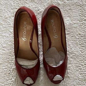 Peep toe, high heels, red patent leather pumps. Comfy chunky 3.5 inch heels.